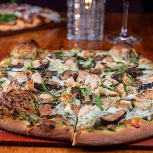 Pollo wood-fired pizza at Benvenuti's