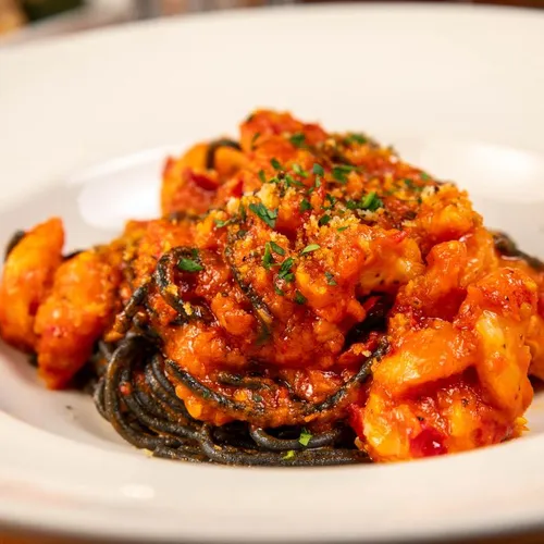 Frutti di mare with squid ink pasta at Benvenuti's